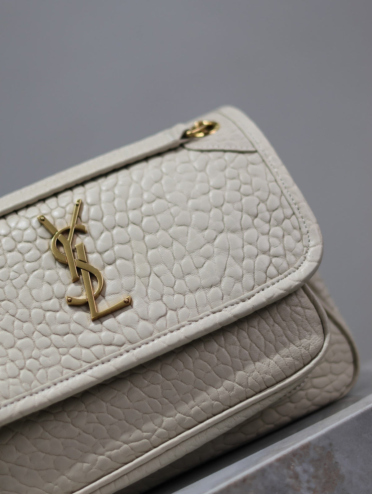 Saint Laurent Niki Baby 22 in White Elephant Pattern Lambskin Gold Logo Bag