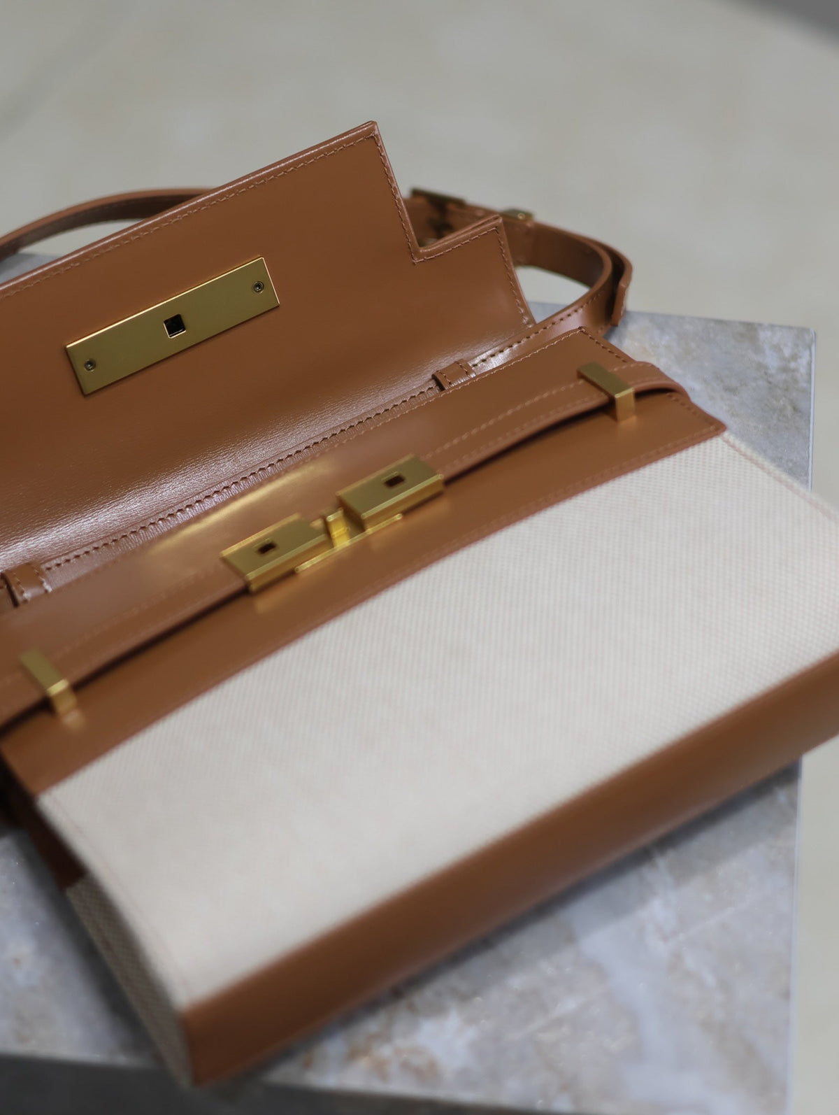 Saint Laurent Manhattan Small 24 in White Canvas and Brown Calfskin Gold Hardware Bag