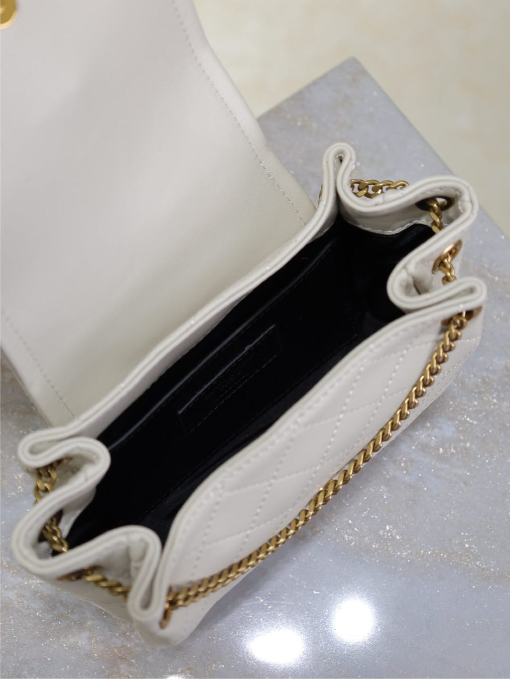 Saint Laurent Mini Nolita Bag 18 in White Lambskin Copper Hardware