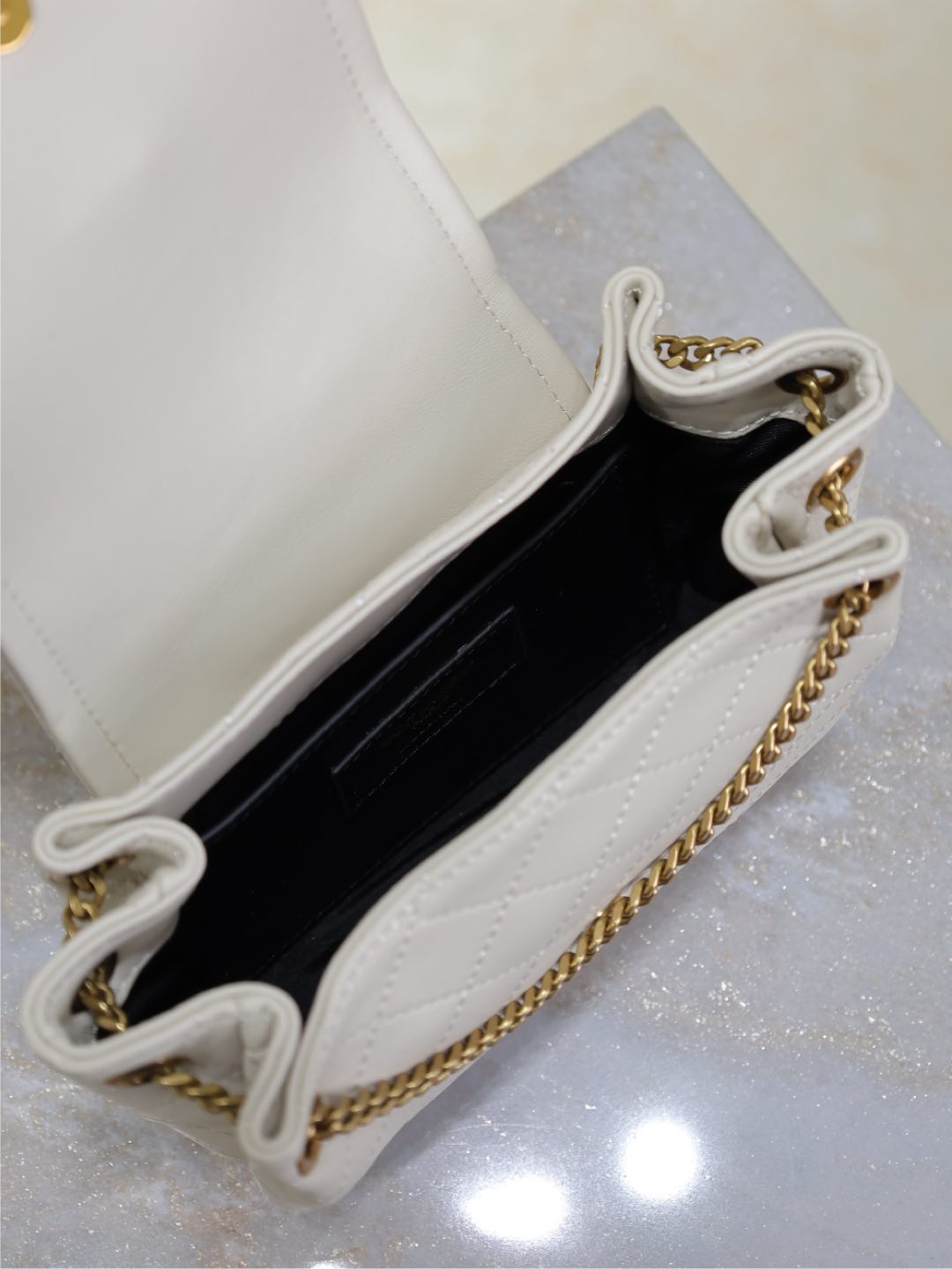 Saint Laurent Mini Nolita Bag 18 in White Lambskin Copper Hardware
